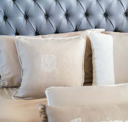 BEIGE CUSHION WITH EMBROIDERY