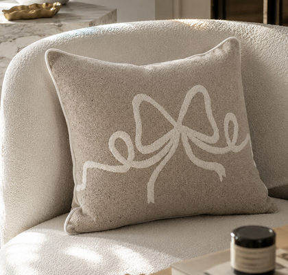 CUSHION WITH BOW