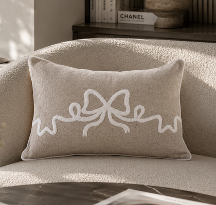 CUSHION WITH BOW