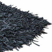 uvozeni-izdelki/preproga-z-usnjenimi-trakci-crna-120x180-E99660_1